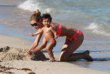 th_65592_Doutzen_Kroes_and_her_son_enjoying_a_day_on_the_beach_in_Miami_FL_March_24_2012_006_122_168lo.jpg