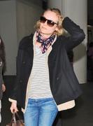 th_31941_Preppie_Diane_Kruger_arriving_into_LAX_Aiport_1_123_400lo.jpg