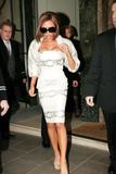 Victoria Beckham in white dress candids