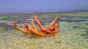 Topless blonde babe and her friend on beach-t4ewvni0er.jpg